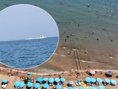 Тревога на пляже в Мерсине: отдыхающих напугала «акула», пляж эвакуировали